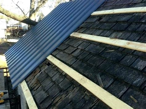 pros and cons of putting metal roof over shingles